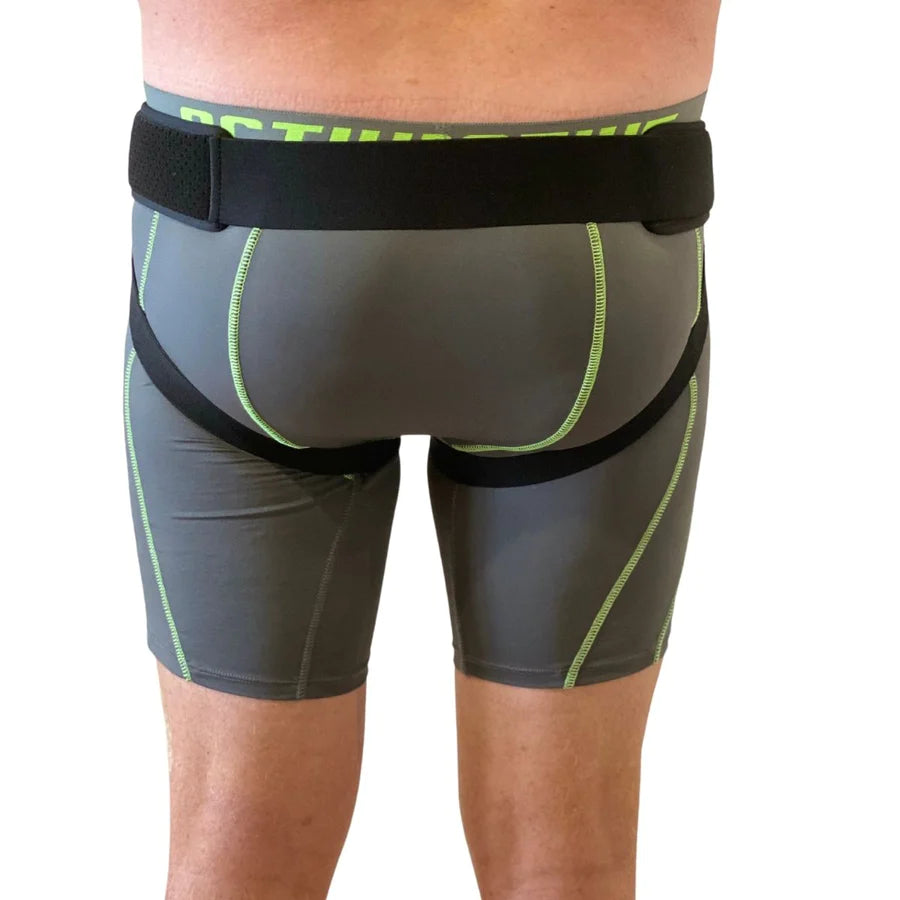 man wearing inguinal support belt