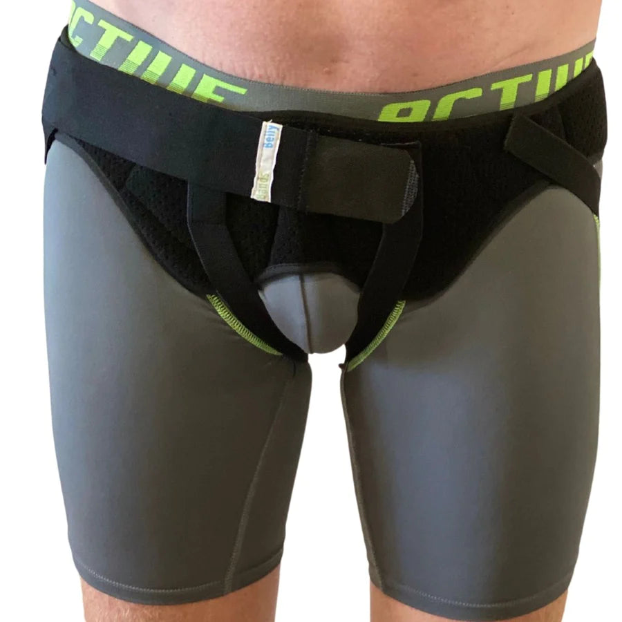Man wearing inguinal hernia belt