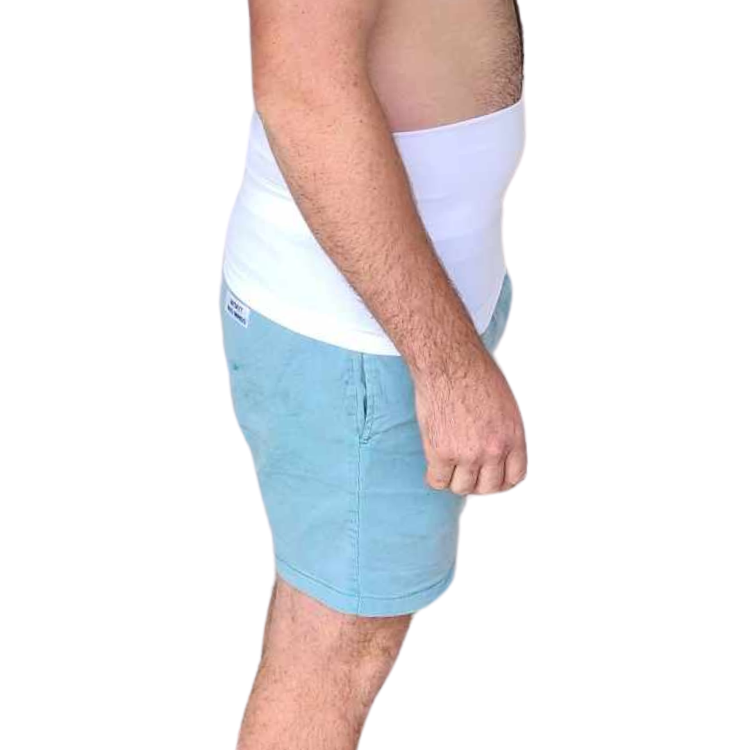 Male wearing a white post-surgical support garment.
