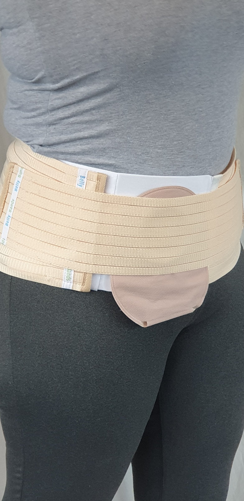 Ostomy belt with stoma bag
